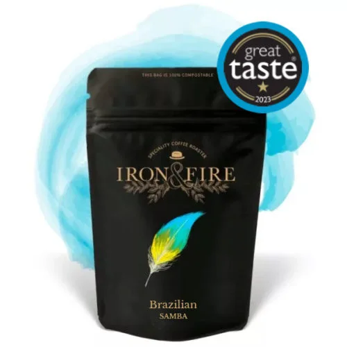 black coloured coffee bag with a blue swirl behind it and a great taste award logo