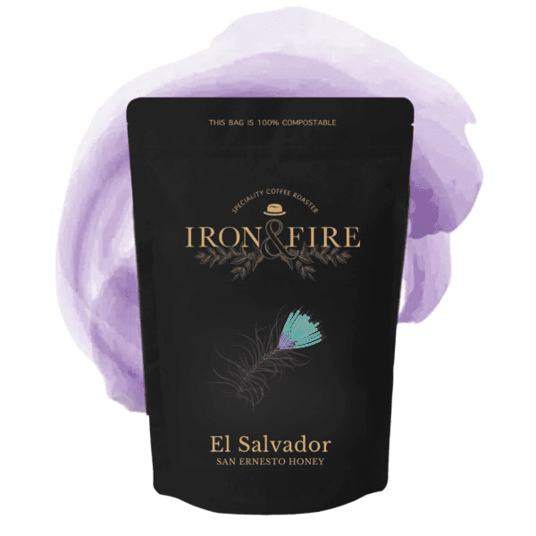 Iron & Fire's El Salvador single origin coffee. A black bag with a purple and blue feather on it.