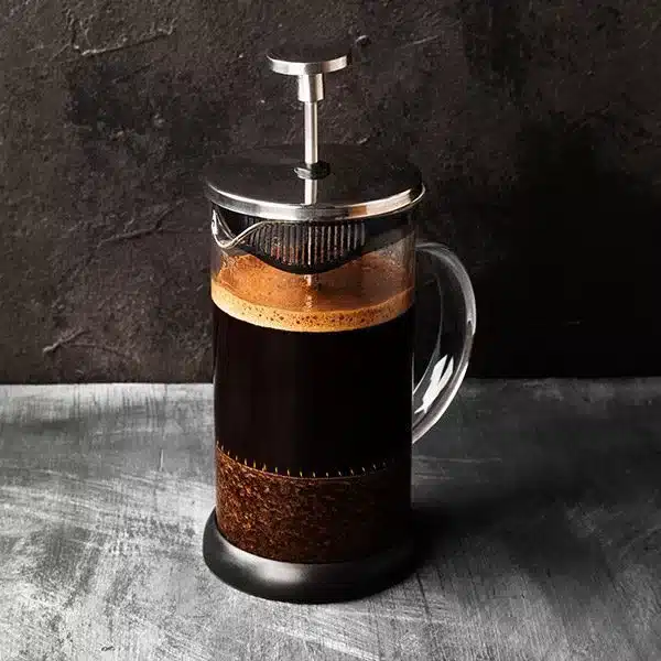 An image of a french press coffee brewer