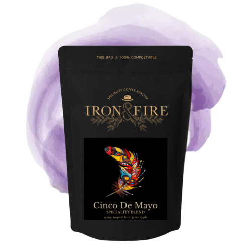 Iron & Fire's Cinco De Mayo speciality coffee; in a black bag with a multi-coloured feather on the front
